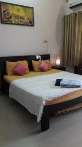 Ένα ή περισσότερα κρεβάτια σε δωμάτιο στο Wow Rooms 4 You