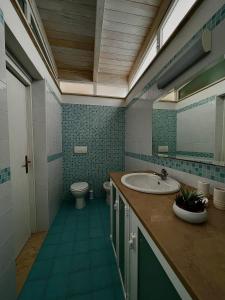 Et badeværelse på villa Dimora Arnesano