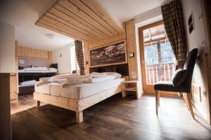 Postel nebo postele na pokoji v ubytování Hotel Niagara + 37 fotografií