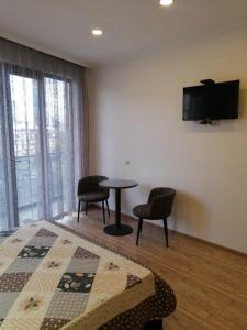 Posezení v ubytování Apartment Vesta Batumi 2