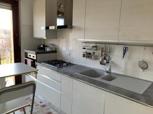 A kitchen or kitchenette at Trilocale in Zona Bocconi/Navigli