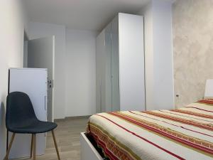 A bed or beds in a room at Trilocale in Zona Bocconi/Navigli