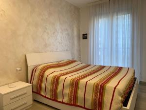 A bed or beds in a room at Trilocale in Zona Bocconi/Navigli