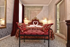 Łóżko lub łóżka w pokoju w obiekcie Locanda Casa Martini