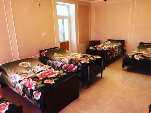 Кровать или кровати в номере Hayq Guest House