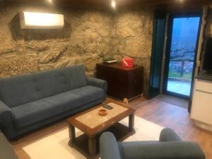 Uma área de estar em Quintinha de Pinouco