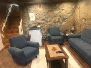 Uma área de estar em Quintinha de Pinouco