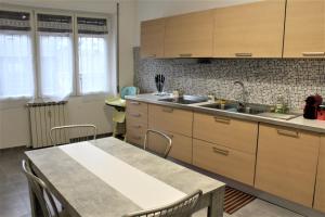 A kitchen or kitchenette at LS-House Apartment - In the Heart of Sanremo
