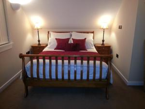 Tempat tidur dalam kamar di Station House Lanark Bed and Breakfast