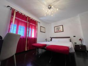 A bed or beds in a room at EGO' Marine