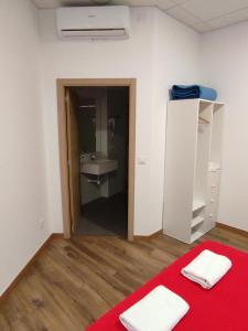 Albergue & Rooms Murgadán客房内的一张或多张床位