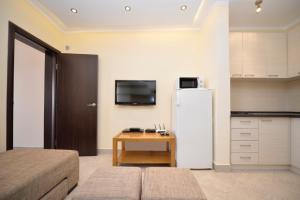 TV a/nebo společenská místnost v ubytování Rafailovici Holiday Apartments