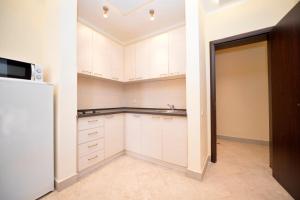 Kuchyň nebo kuchyňský kout v ubytování Rafailovici Holiday Apartments