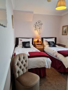 Ένα ή περισσότερα κρεβάτια σε δωμάτιο στο Rowan Tree House B&B