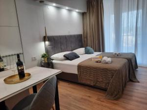 Een bed of bedden in een kamer bij Apartments Amari