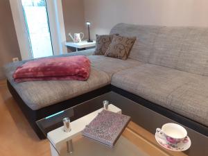 Posezení v ubytování Schöne und ruhige Ferienwohnung in Ottendorf
