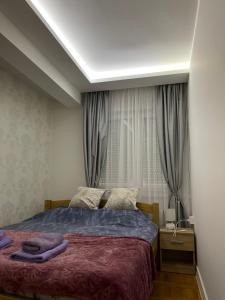 Voodi või voodid majutusasutuse Apartman MDB toas