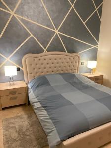 A bed or beds in a room at Molino Apartments