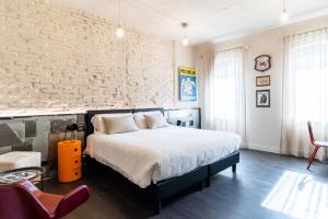 Ένα ή περισσότερα κρεβάτια σε δωμάτιο στο Casa Babbuino