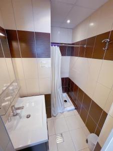 Koupelna v ubytování Hotel Le Ronchamp
