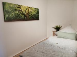 Ένα ή περισσότερα κρεβάτια σε δωμάτιο στο Ferienwohnung Auenland
