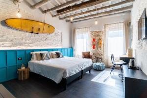 A bed or beds in a room at Casa Babbuino
