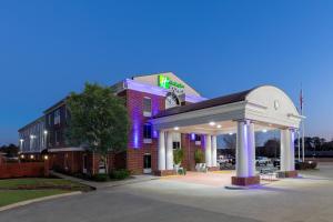 a hotel with a gazebo in front of a building at Holiday Inn Express Minden, an IHG Hotel in Minden