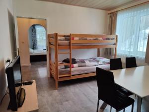 Postel nebo postele na pokoji v ubytování Pension Almhof