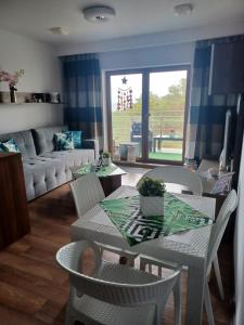 Posedenie v ubytovaní Apartament z widokiem na morze