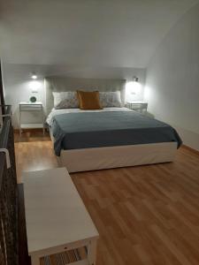Кровать или кровати в номере Casa PlaLu'