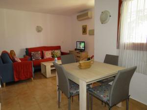 TV a/nebo společenská místnost v ubytování Apartamento Oasis Park
