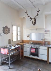 Kuchyň nebo kuchyňský kout v ubytování LosGuachos_ casa rural