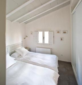 Postel nebo postele na pokoji v ubytování LosGuachos_ casa rural