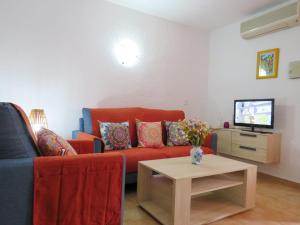TV a/nebo společenská místnost v ubytování Apartamento Oasis Park