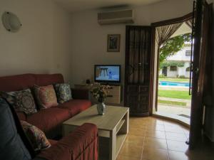 TV a/nebo společenská místnost v ubytování Apartamento Oasis Park