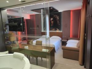 TV a/nebo společenská místnost v ubytování Hotel Camelia