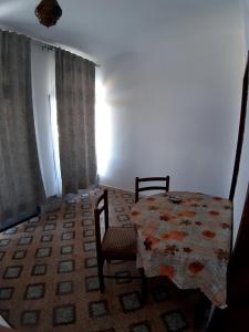Postel nebo postele na pokoji v ubytování Οδυσσέας