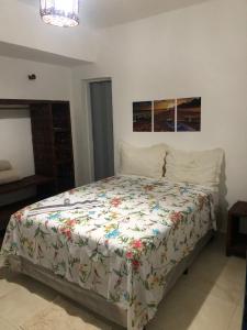 Кровать или кровати в номере Restaurante & Pousada Portal dos Ventos