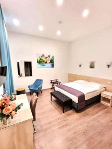 Posteľ alebo postele v izbe v ubytovaní Global Suites Budapest