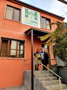 a group of people standing outside of a building at Bee Lucky Hostel and Tours in Yerevan