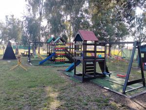 a group of playground equipment in a park at casadolcecasalatina in Latina