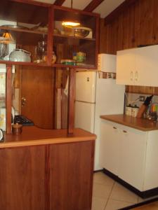 Kuchyň nebo kuchyňský kout v ubytování Cabañas La Cumbre