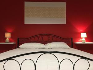 A bed or beds in a room at Hospiton Home