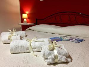 A bed or beds in a room at Hospiton Home