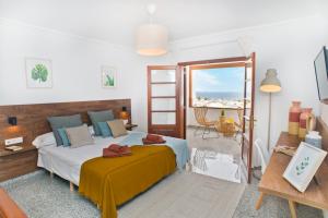 Postel nebo postele na pokoji v ubytování Villa Pilar + 28 fotografií