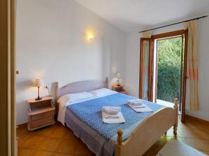 Postel nebo postele na pokoji v ubytování Residenza Pierre et Vacances Badus
