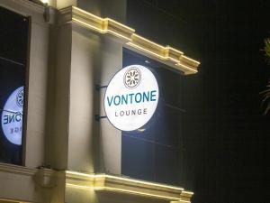 a sign on the side of a building at Veliton Hotel in Al Khobar