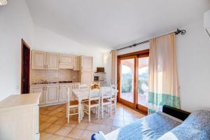 Kuchyň nebo kuchyňský kout v ubytování Residenza Pierre et Vacances Badus