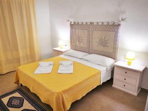 Postel nebo postele na pokoji v ubytování Residenza Pierre et Vacances Badus