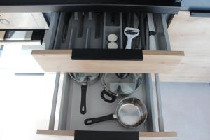 Kuchyň nebo kuchyňský kout v ubytování Apartament Fibra Freddo